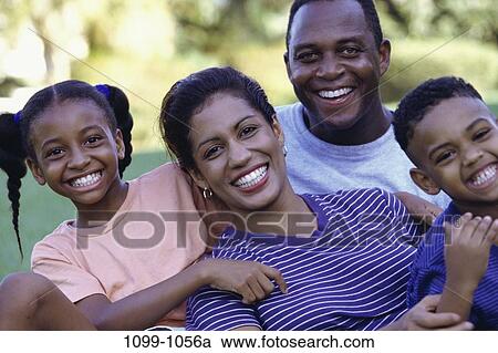 people, smiling, sitting, outdoors, unity, family View Large Photo Image Stock Image - people, smiling, sitting, outdoors, unity, family. Fotosearch