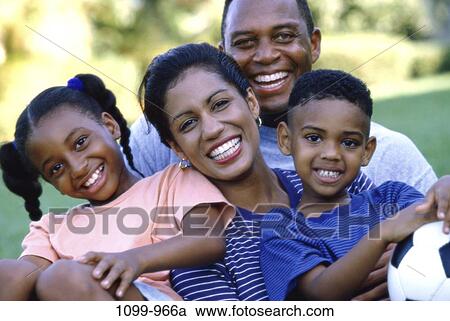 people, smiling, sitting, outdoors, unity, family, posing View Large Photo Image Stock Image - people, smiling, sitting, outdoors, unity, family, posing. Fotosearch