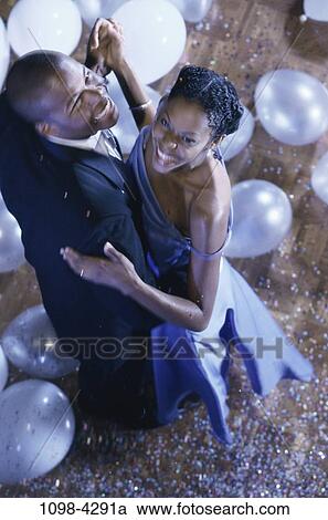 people, smiling, suit, couple, balloons, dancing, dress View Large Photo Image Stock Image - people, smiling, suit, couple, balloons, dancing, dress. Fotosearch