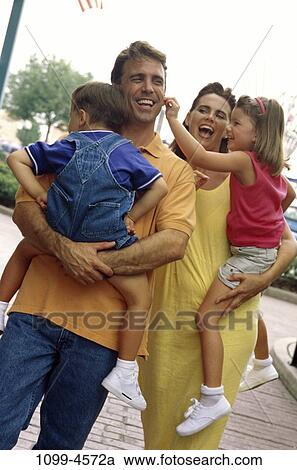 people, smiling, walking, happy, playful, ear, carrying View Large Photo Image Stock Image - people, smiling, walking, happy, playful, ear, carrying. Fotosearch