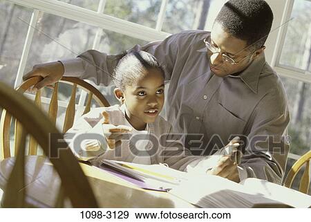 people, table, eyeglasses, window, reading, homework View Large Photo Image Stock Photo - people, table, eyeglasses, window, reading, homework. Fotosearch