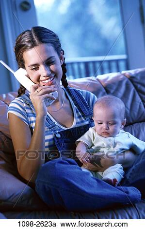 people, telephone, talking, sitting, baby, phone, watch View Large Photo Image Stock Image - people, telephone, talking, sitting, baby, phone, watch. Fotosearch
