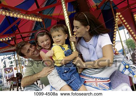 people, time, riding, carnival, park, amusement, family View Large Photo Image Stock Image - people, time, riding, carnival, park, amusement, family. Fotosearch