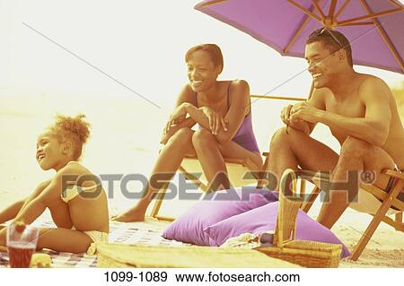 people, umbrella, beach, basket, lifestyles, joyous, outings View Large Photo Image Stock Photo - people, umbrella, beach, basket, lifestyles, joyous, outings. Fotosearch