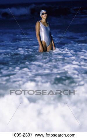 people, wading, water, woman, Hispanic, silver, evening View Large Photo Image Stock Photo - people, wading, water, woman, Hispanic, silver, evening. Fotosearch
