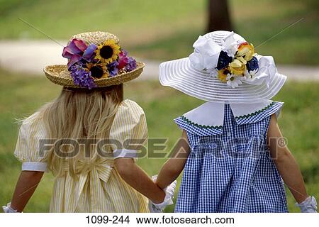 people, walking, hats, friendship, pairs, sweet, children View Large Photo Image Picture - people, walking, hats, friendship, pairs, sweet, children. Fotosearch