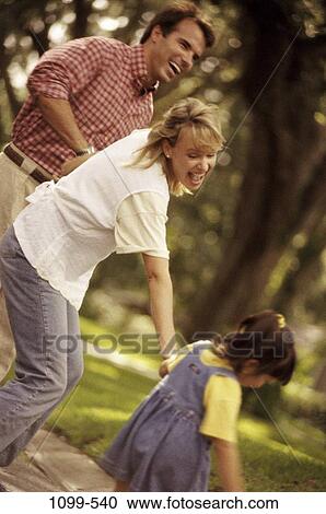 people, walking, laughing, outdoors, adventurous, family, Caucasian View Large Photo Image Stock Image - people, walking, laughing, outdoors, adventurous, family, Caucasian. Fotosearch