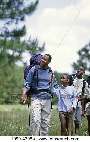 people, walking, pointing, outdoors, family, showing, hiking View Large Photo Image Stock Image - people, walking, pointing, outdoors, family, showing, hiking. Fotosearch