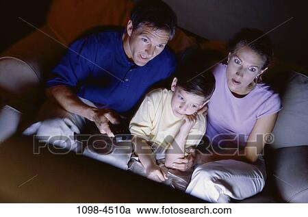 people, watch, couch, awe, watching, television, family View Large Photo Image Stock Image - people, watch, couch, awe, watching, television, family. Fotosearch