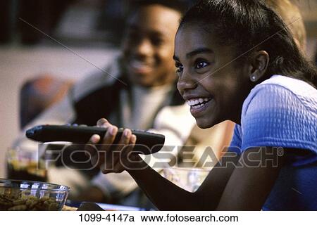 people, watch, girl, curious, watching, television, children View Large Photo Image Stock Image - people, watch, girl, curious, watching, television, children. Fotosearch