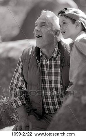 people, watch, outdoors, watching, family, grandfather, grandchild View Large Photo Image Stock Image - people, watch, outdoors, watching, family, grandfather, grandchild. Fotosearch