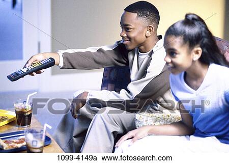 people, watch, watching, television, children, teens, remote View Large Photo Image Stock Image - people, watch, watching, television, children, teens, remote. Fotosearch