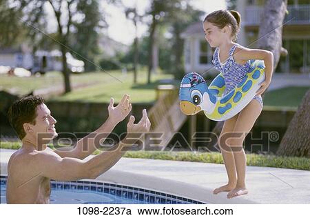 Stock Image - people, water, beach, anxious, nurturing, poolside. Fotosearch