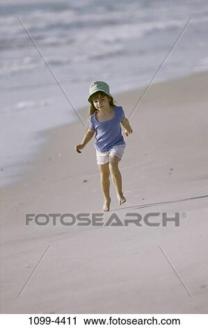 people, water, hat, walking, beach, holding, girl View Large Photo Image Stock Image - people, water, hat, walking, beach, holding, girl. Fotosearch