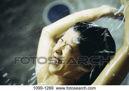 people, water, woman, smiling, Asian, spraying View Large Photo Image Stock Photo - people, water, woman, smiling, Asian, spraying. Fotosearch