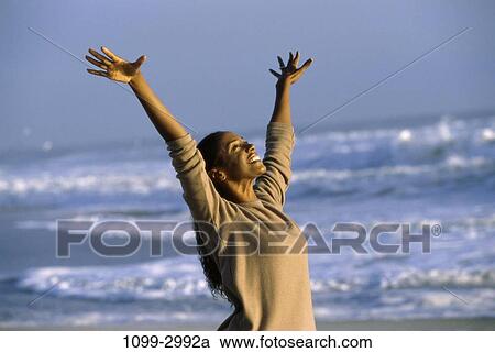 people, water, woman, smiling, morning, beach, stretching View Large Photo Image Stock Image - people, water, woman, smiling, morning, beach, stretching. Fotosearch