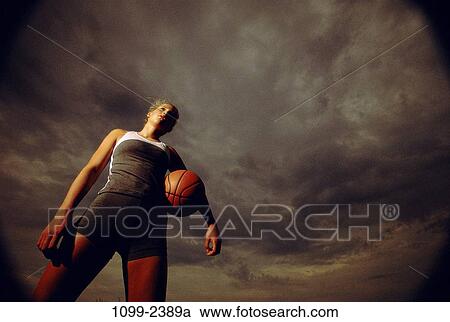 people, woman, clouds, ball, standing, outdoors, serious View Large Photo Image Stock Image - people, woman, clouds, ball, standing, outdoors, serious. Fotosearch