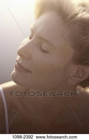 people, woman, eyes, meditation, outdoors, Middle-aged, closed View Large Photo Image Stock Image - people, woman, eyes, meditation, outdoors, Middle-aged, closed. Fotosearch