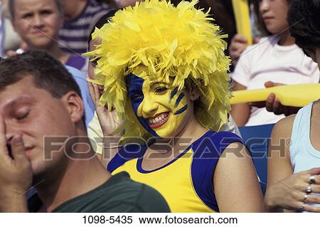 Stock Photography - people, woman, face, sports, paint, crowd, spectator. Fotosearch