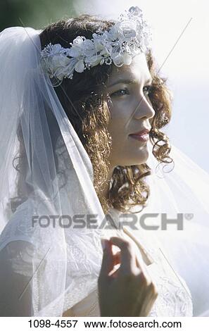 people, woman, Hispanic, outdoors, wedding, veil, bride View Large Photo Image Stock Photo - people, woman, Hispanic, outdoors, wedding, veil, bride. Fotosearch