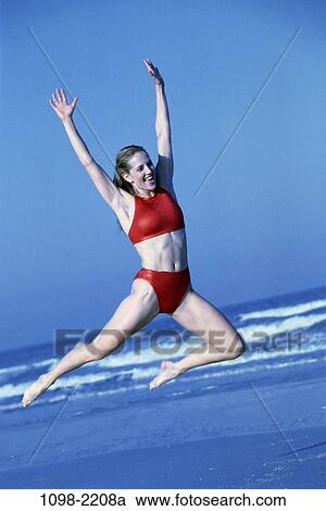 people, woman, jump, jumping, excitement, excited, happy View Large Photo Image Stock Image - people, woman, jump, jumping, excitement, excited, happy. Fotosearch