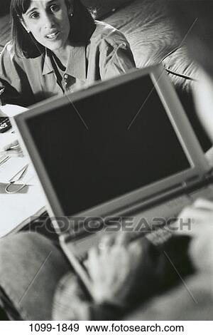 people, woman, laptop, typing, stress, Middle-aged, contemplation View Large Photo Image Stock Photo - people, woman, laptop, typing, stress, Middle-aged, contemplation. Fotosearch