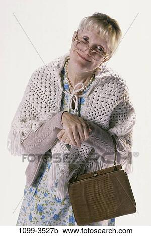 people, woman, smiling, eyeglasses, senior, purse, smile View Large Photo Image Stock Image - people, woman, smiling, eyeglasses, senior, purse, smile. Fotosearch