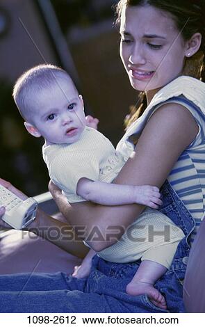people, woman, telephone, mother, baby, holding, stress View Large Photo Image Stock Image - people, woman, telephone, mother, baby, holding, stress. Fotosearch