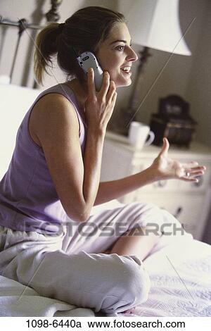 people, woman, telephone, talking, sitting, phone, bed View Large Photo Image Stock Image - people, woman, telephone, talking, sitting, phone, bed. Fotosearch