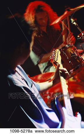 performance, performing, band, musicians, drummer, occupation, guitarist View Large Photo Image Stock Image - performance, performing, band, musicians, drummer, occupation, guitarist. Fotosearch