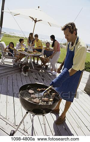 relaxed, eating, table, cooking, relaxing, deck, family View Large Photo Image Stock Image - relaxed, eating, table, cooking, relaxing, deck, family. Fotosearch