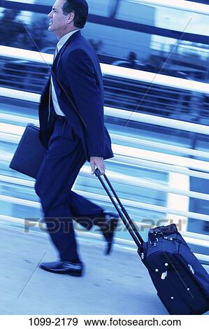 running, briefcase, rush, luggage, business, outdoors View Large Photo Image Stock Photo - running, briefcase, rush, luggage, business, outdoors. Fotosearch