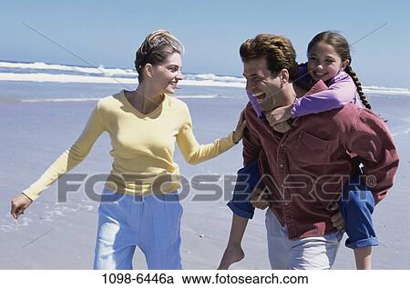 sand, people, beach, playful, waves, carrying View Large Photo Image Stock Image - sand, people, beach, playful, waves, carrying. Fotosearch