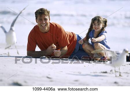 sand, people, birds, water, sea, beach, pointing View Large Photo Image Stock Image - sand, people, birds, water, sea, beach, pointing. Fotosearch