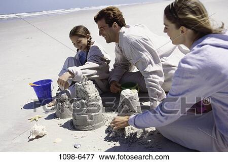 sand, people, building, beach, family, daughter View Large Photo Image Stock Photo - sand, people, building, beach, family, daughter. Fotosearch