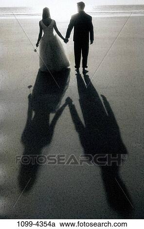 sand, people, hands, shadows, walking, couple, beach View Large Photo Image Stock Image - sand, people, hands, shadows, walking, couple, beach. Fotosearch