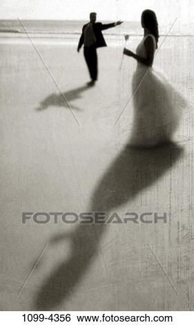 sand, people, shadows, water, couple, beach, rose View Large Photo Image Stock Photograph - sand, people, shadows, water, couple, beach, rose. Fotosearch
