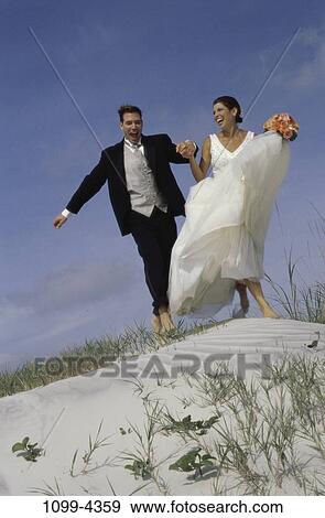 sand, people, smiling, couple, sand dune, beach, laughing View Large Photo Image Stock Photo - sand, people, smiling, couple, sand dune, beach, laughing. Fotosearch