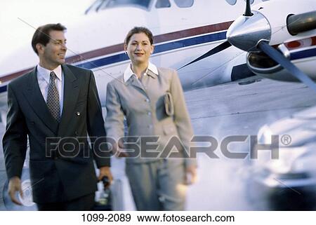 smiling, briefcase, Hispanic, business, outdoors, Middle-aged, executives View Large Photo Image Stock Photo - smiling, briefcase, Hispanic, business, outdoors, Middle-aged, executives. Fotosearch