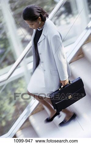steps, stairs, woman, walking, briefcase, motion, business View Large Photo Image Stock Photo - steps, stairs, woman, walking, briefcase, motion, business. Fotosearch