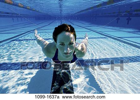 swim, water, pool, woman, swimming, outdoors, tranquility View Large Photo Image Stock Image - swim, water, pool, woman, swimming, outdoors, tranquility. Fotosearch