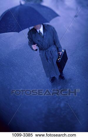 umbrella, briefcase, rain, standing, business, outdoors View Large Photo Image Stock Photography - umbrella, briefcase, rain, standing, business, outdoors. Fotosearch