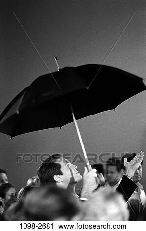 umbrella, holding, business, outdoors, weather, businessmen, hold View Large Photo Image Stock Image - umbrella, holding, business, outdoors, weather, businessmen, hold. Fotosearch