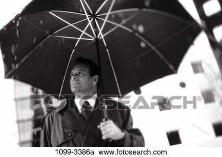 umbrella, rain, business, outdoors, weather, Middle-aged View Large Photo Image Stock Image - umbrella, rain, business, outdoors, weather, Middle-aged. Fotosearch