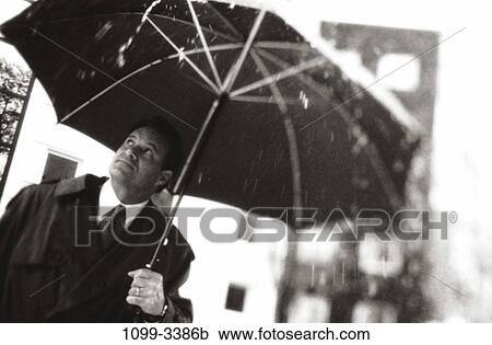 umbrella, rain, business, outdoors, weather, Middle-aged View Large Photo Image Stock Image - umbrella, rain, business, outdoors, weather, Middle-aged. Fotosearch