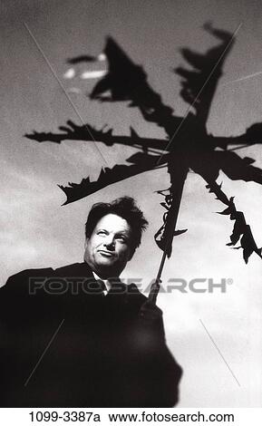 Stock Image - umbrella, windy, broken, business, outdoors, weather. Fotosearch