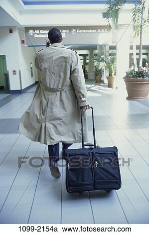 walking, luggage, back, business, transportation, pulling View Large Photo Image Stock Image - walking, luggage, back, business, transportation, pulling. Fotosearch