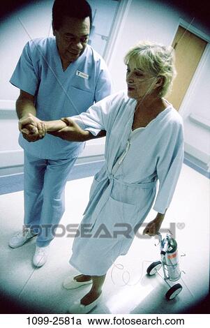 walking, patient, doctor, nurse, helping, illness, caring View Large Photo Image Stock Image - walking, patient, doctor, nurse, helping, illness, caring. Fotosearch