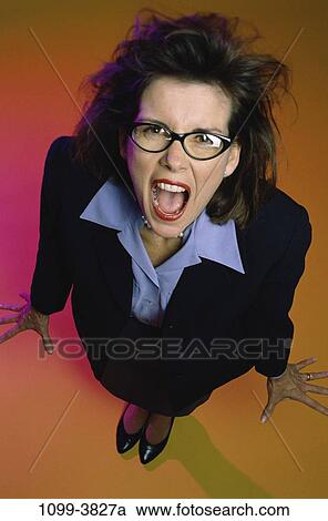 woman, eyeglasses, stress, business, Middle-aged, frustrated, yelling View Large Photo Image Stock Image - woman, eyeglasses, stress, business, Middle-aged, frustrated, yelling. Fotosearch