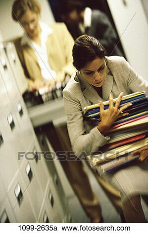women, overwhelmed, research, business, Middle-aged, carrying, folders View Large Photo Image Stock Image - women, overwhelmed, research, business, Middle-aged, carrying, folders. Fotosearch